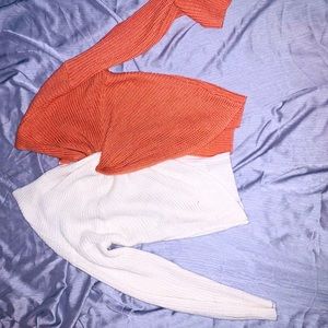 White and orange sweater